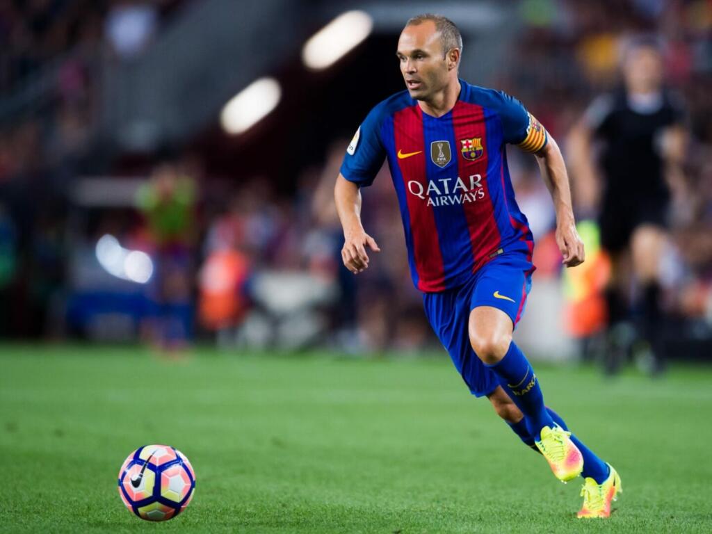 image of andres iniesta playing soccer