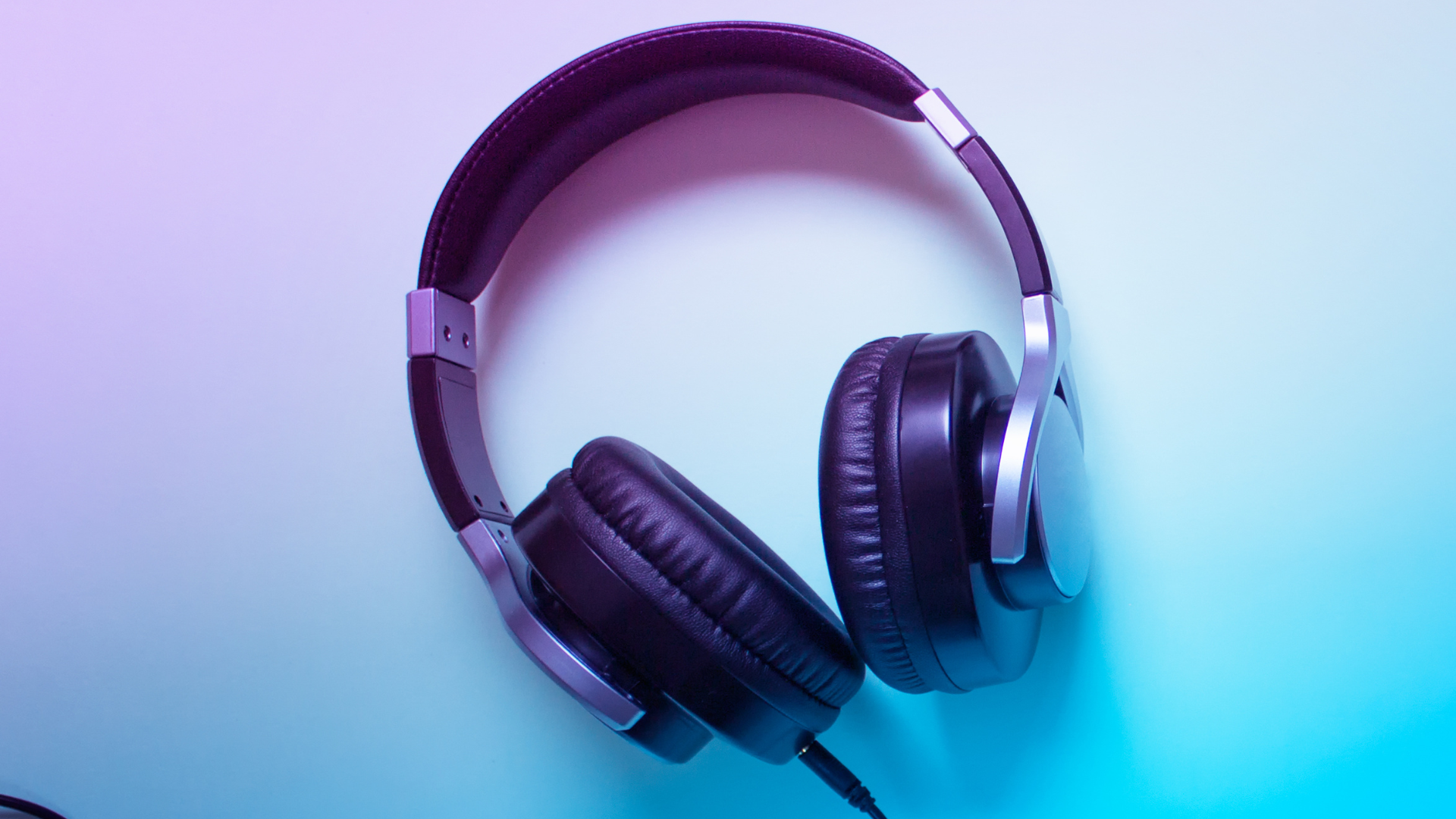 Black Headphones on Gradient Background 