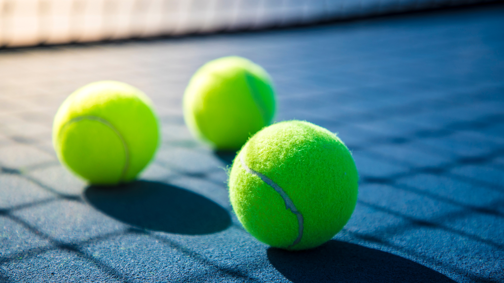 Tennis balls on court - This Week In Social