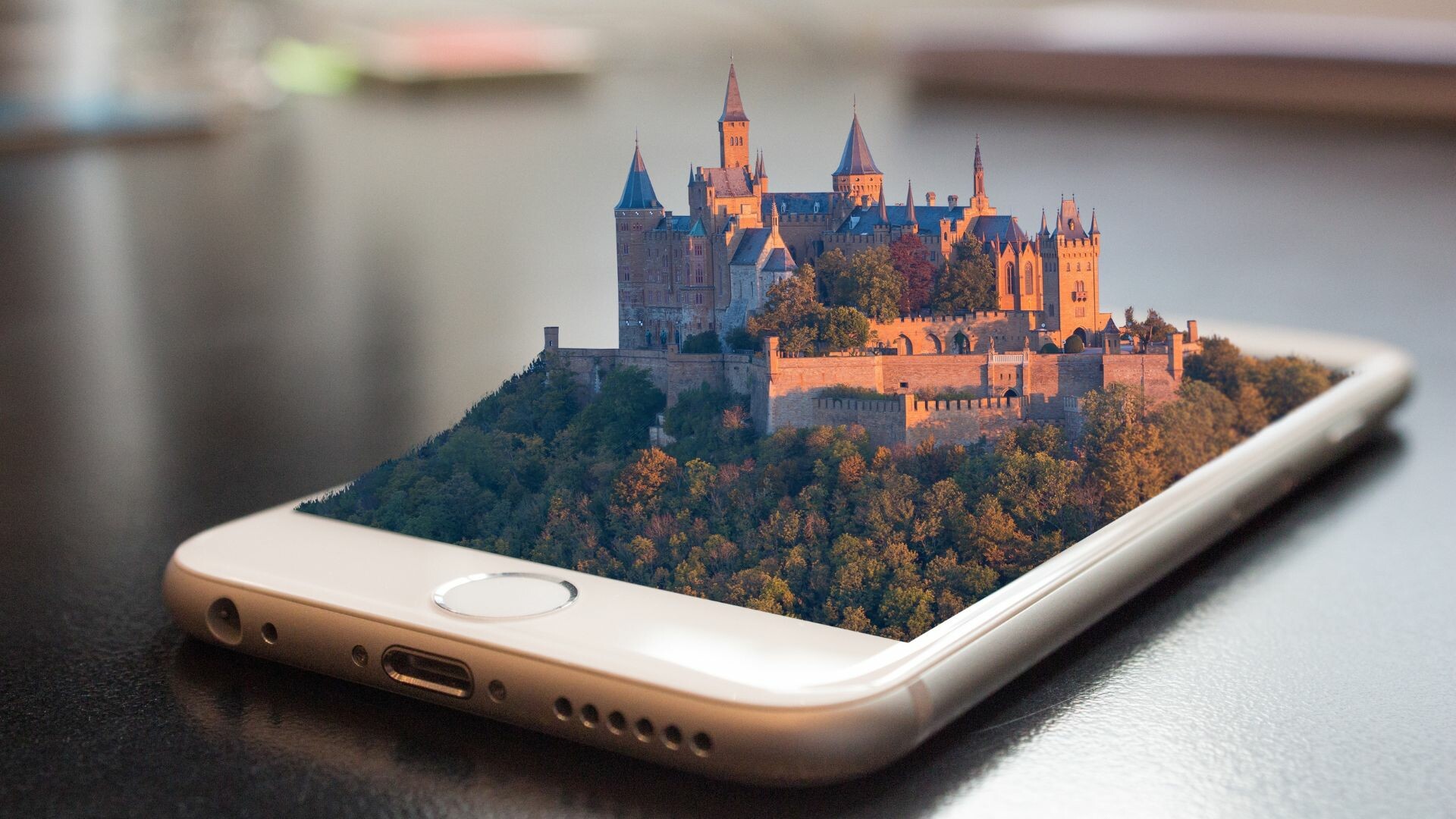 3D image of a castle coming out of a phone.