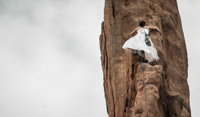 Woman rock climbing