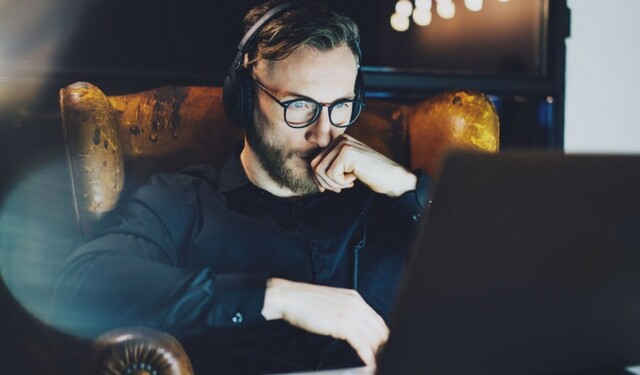 Man looking at laptop