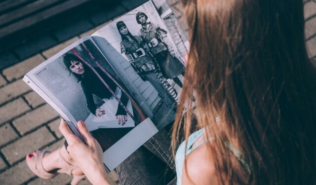 Woman reading a magazine