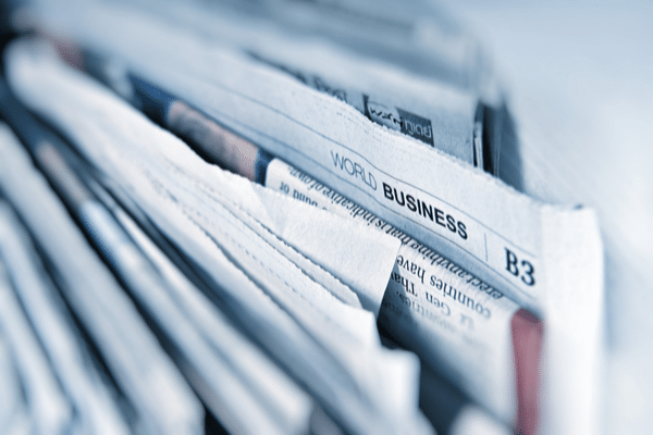 stack of newspapers, public relations, press release