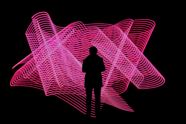 person in front of pink light, business continuity