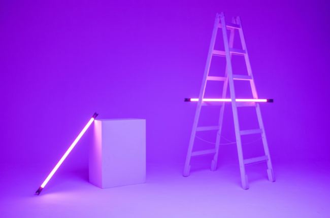 Purple neon-lit ladder and block