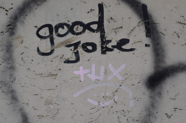 Graffiti "good joke. thx" on gray wall