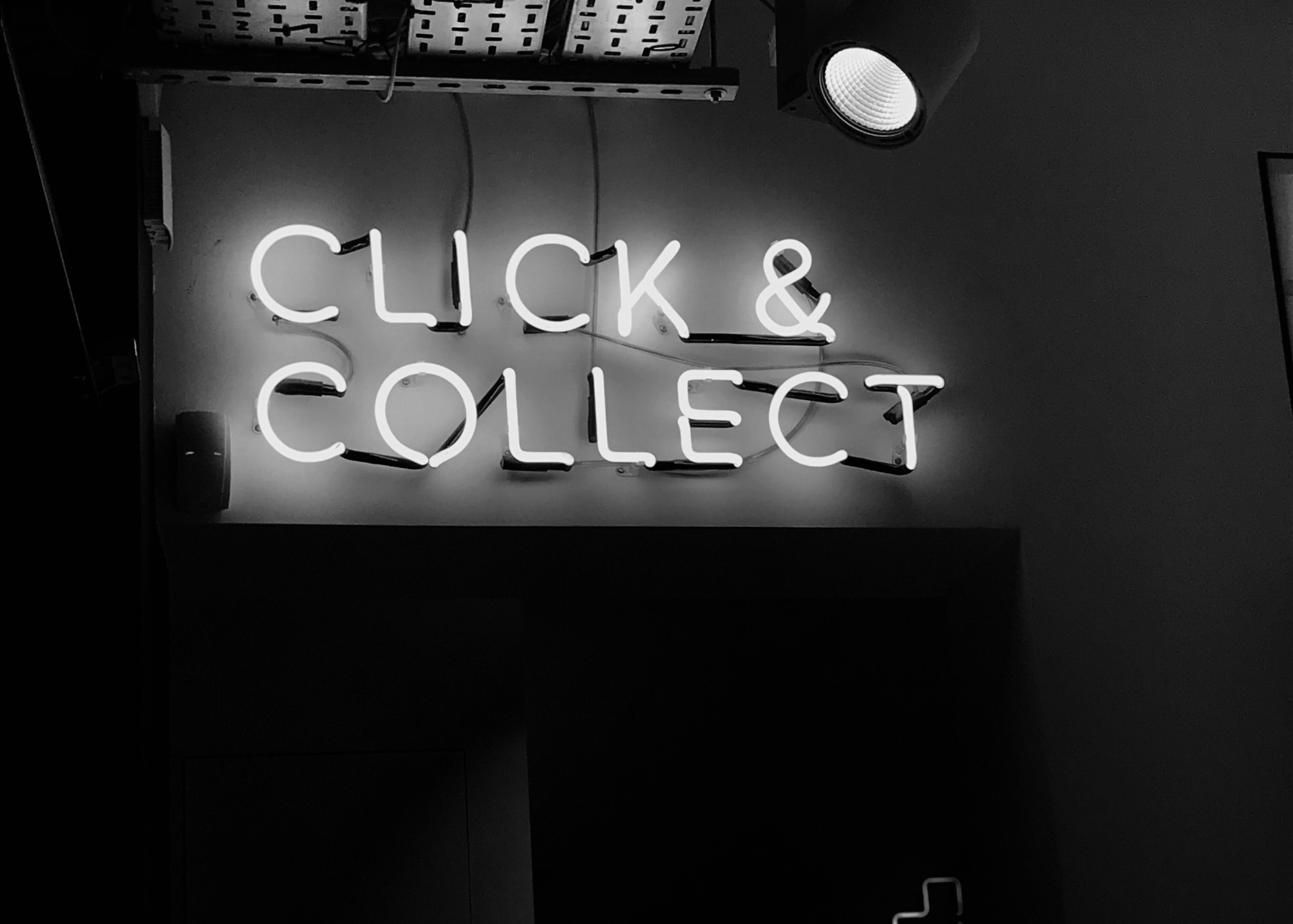 white LED click and collect sign