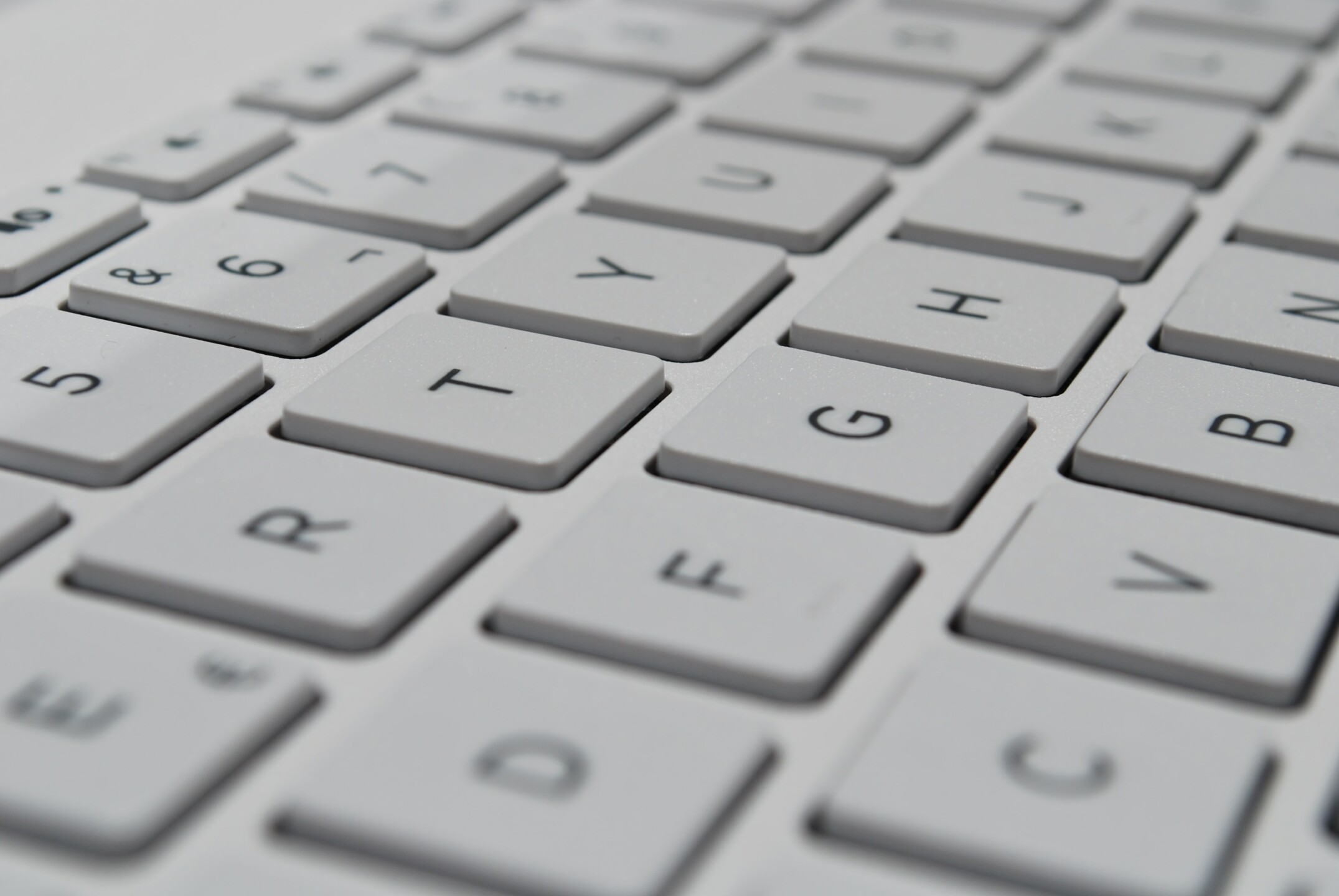 white keyboard with zoomed in keys